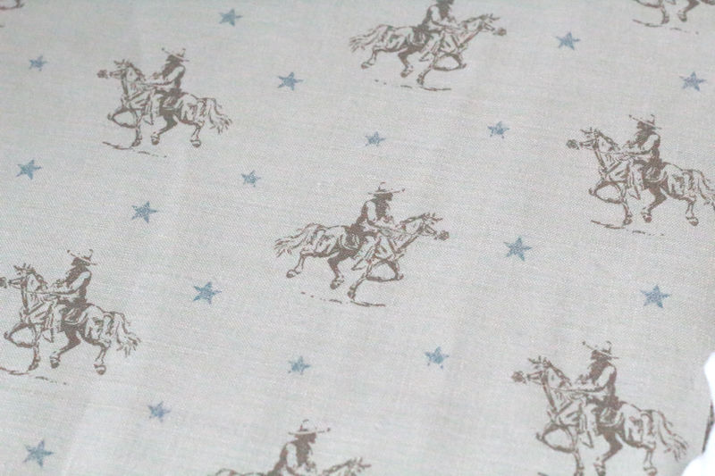 Thumbnail: Peony & Sage Linen Doorstop - Mini Vintage Cowboys Mole / Oxford Blue, fabric view