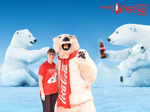 woman posing with Coca Cola polar bear
