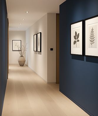 Modern hallway with blue accent wall, light wood flooring, and minimalist decor — AGAB Remodeling South Florida