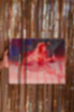 Acrylic painting on canvas of reclining nude figure with spilling red liquid.