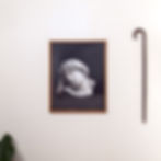 Framed classical bust artwork and walking stick