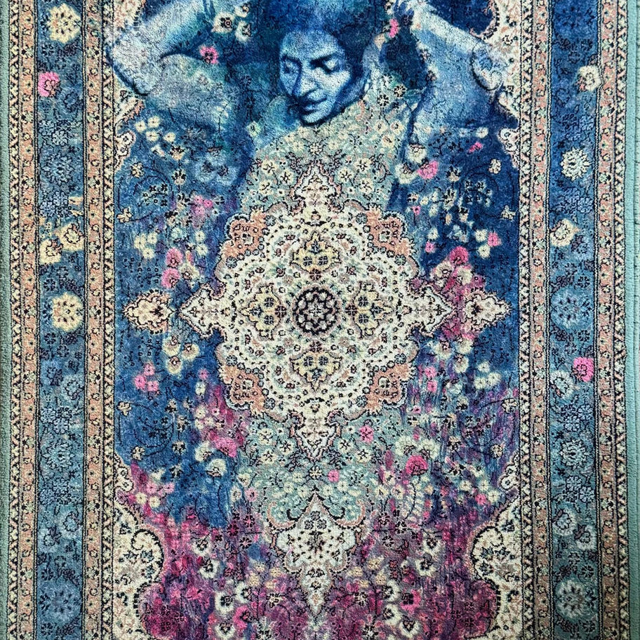 Abstract oil artwork of a woman's face on a patterned blue background