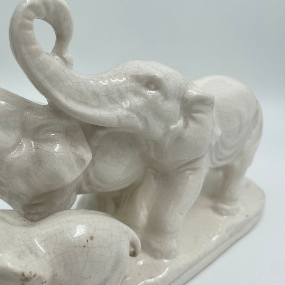 Figurine éléphants en porcelaine art déco