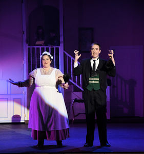 Mrs. Brill and Robertson Ay singing.