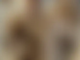 A noble paladin of the Golden Lions mounted on a white warhorse, both adorned with golden lion insignias, ready for battle beneath a dawn-lit sky.