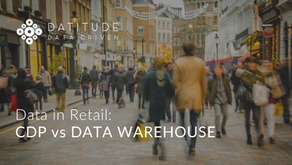 Busy shopping street with people in coats, festive lights, and text: Data in Retail: CDP vs DATA WAREHOUSE on the image. Mood is lively. Datitude logo