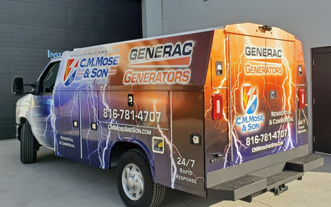 Generac generators service truck with C.M. Mose & Son lettering and phone number.