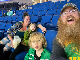 Local Mascot Makes Boys' Day As Passionate Hockey Family Falls Short As Fans.