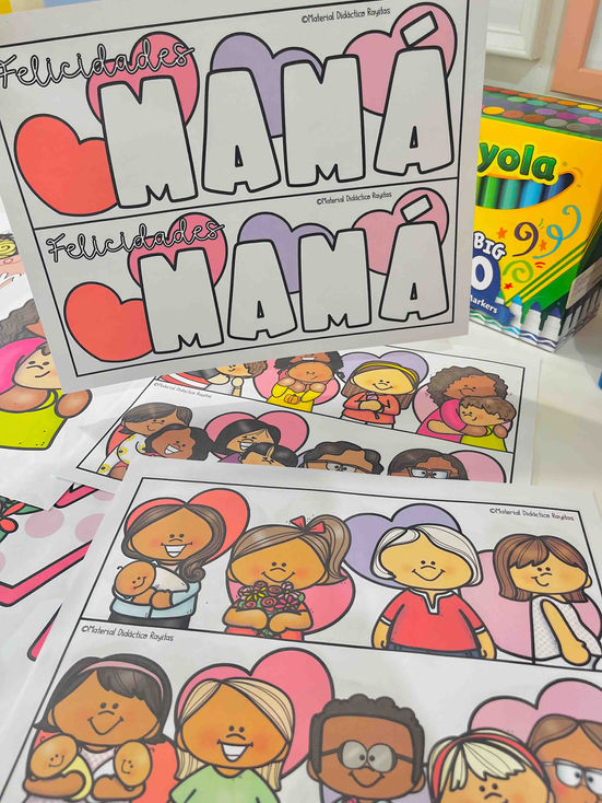 Decoración colorida de aula para Mayo con flores y mural 'Mamá'.