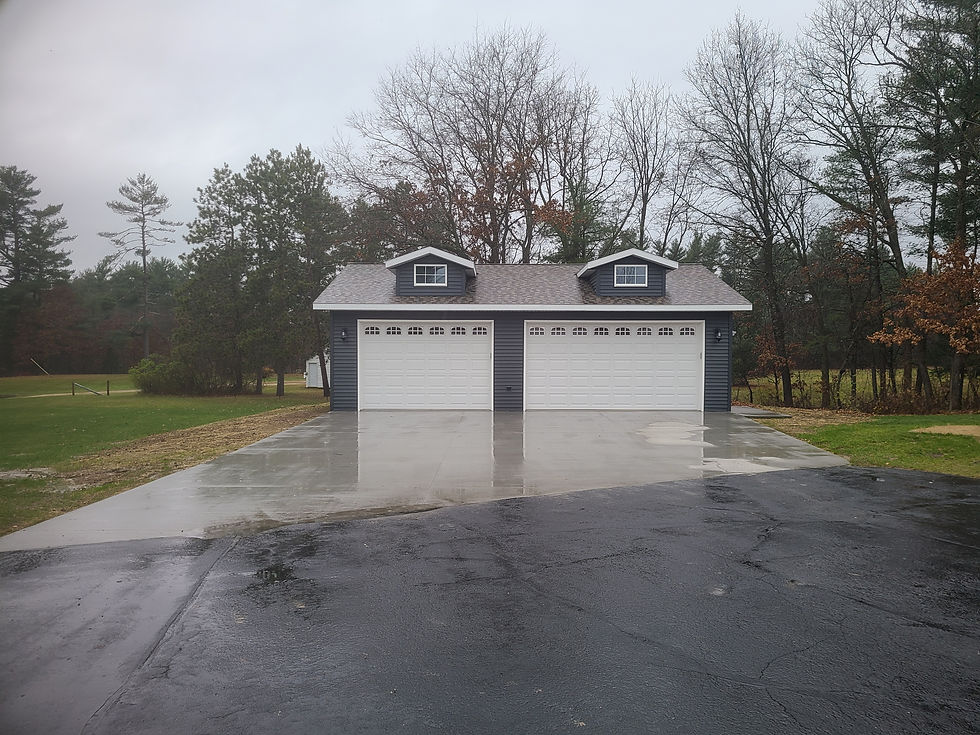 Custom garage built for toy and equipment storage by Coulee Carpentry