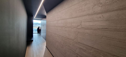 Marmorino et empreintes
enduit minéral texturé Lausanne design intérieur contemporain