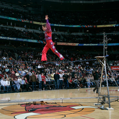 Fletcher Runyan conducting a safety and structural rigging inspection at the court level for the Chicago Bulls commercial project
