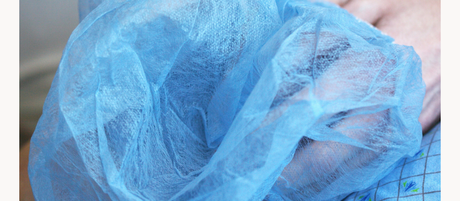 Close-up of a nurse or patient in a hospital gown with disposable blue shoe covers in focus. The overlay text reads “Clinical Worst Rotation… Until It Wasn’t” with a CTA at the bottom: “HERE’S WHY – Perspective33.com – Subscribe Now.” The image evokes curiosity about a surprising lesson from an unexpected clinical experience.
