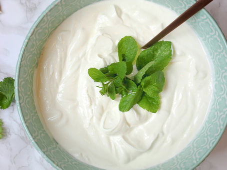 Bowl of yogurt with a spoon