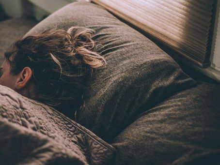 Woman sleeping peacefully in bed