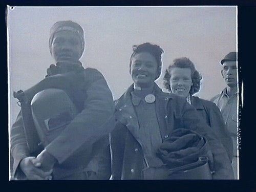 Figure 3. Photograph of women lining up for paychecks - Richmond shipyards. Oakland Museum of California – Lange (Dorothea) Collection. 1942/1943. Identifier: LNG42080.4. Calisphere – University of California.