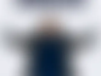 Grace from Saving Grace Medical Academy making a snow angel outdoors with the title ‘Cold-Related Medical Emergencies,’ representing winter hazards like frostbite, hypothermia, and the importance of BLS training for nursing students.