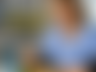 Nurse eating a healthy meal with water during a hospital shift to maintain energy and focus, highlighting the importance of nutrition for healthcare professionals training in CPR, First Aid, and Basic Life Support at Saving Grace Medical Academy.