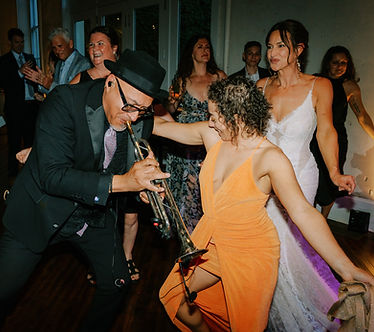 CCO's trumpet player on the dance floor at Excelsior
