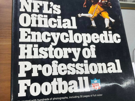 Vintage football encyclopedia in antique mall