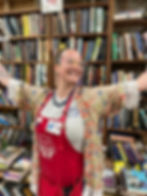 America's Antique Mall staff in front of bookshelf