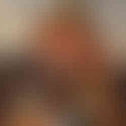 Vintage Lemax Christmas Village setup with lights