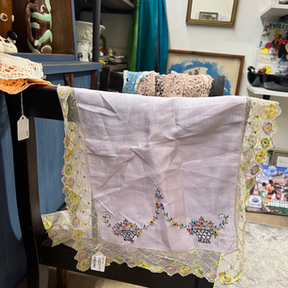 Vintage linen table runner with floral lace edge