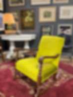 Bright upholstered vintage rocking chair