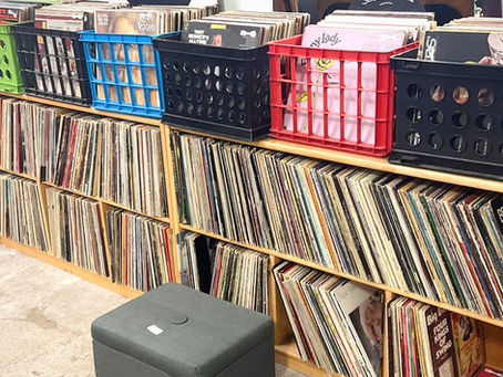 Shelves and crates of vinyl record collectibles