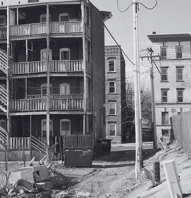 black and white photo of broken buildings