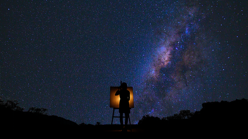 woman standing at an easel painting under a starry sky
