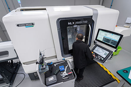DMG MORI NLX-2500 | 700 Turning Centre being operated by machinist in workshop