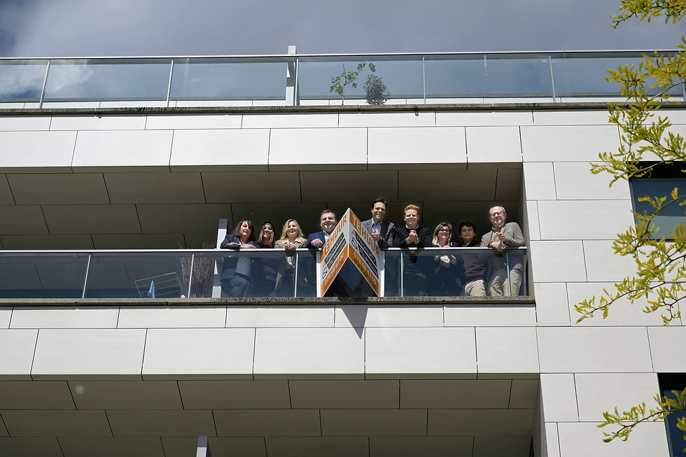 Group of estate agents at a commercial property open day. 
