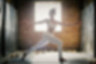 a-blonde-woman-doing-a-yoga-pose-arms-outstretche-2023-11-27-05-25-51-utc.jpg