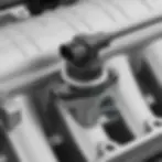 Close-up illustration of an automotive MAP (Manifold Absolute Pressure) sensor mounted on an engine intake manifold with digital waveforms indicating pressure measurement, shown in a blue prism technology style.