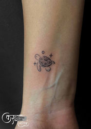 Small turtle tattoo design on arm Sundernagar