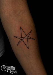 Geometric star tattoo on arm Sundernagar