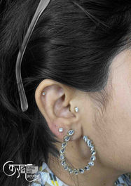 Tragus ear piercing Sundernagar