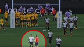 RWC REFEREE CAUGHT GIVING A FIJIAN PLAYER A LOW-FIVE WHEN WINNING AGAINST THE WALLABIES.