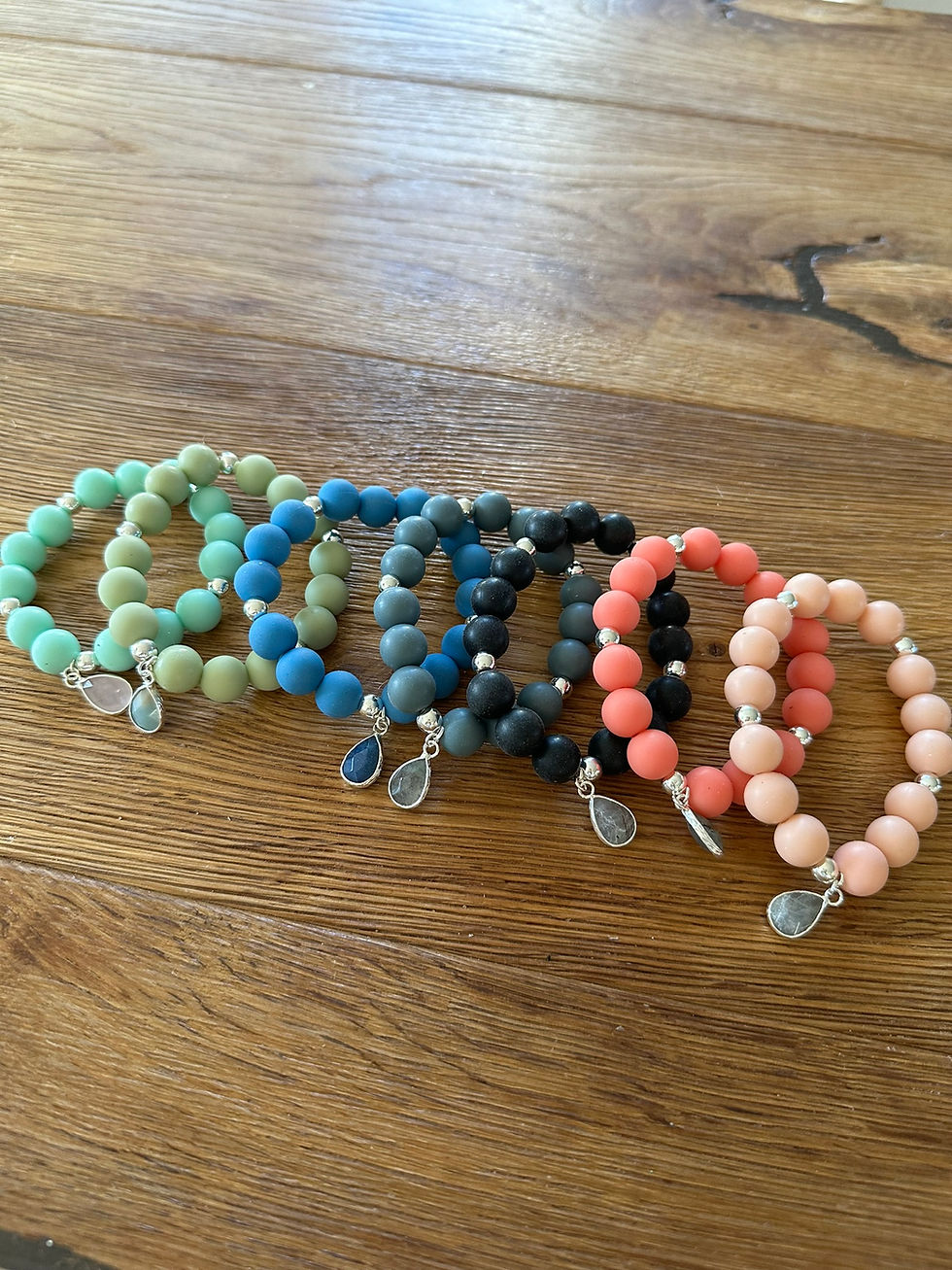 Miniaturbild: Leuchtgrünes Silikon Armband mit versilberten Hämatit