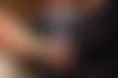 close-up of hands of a bride and groom at the altar