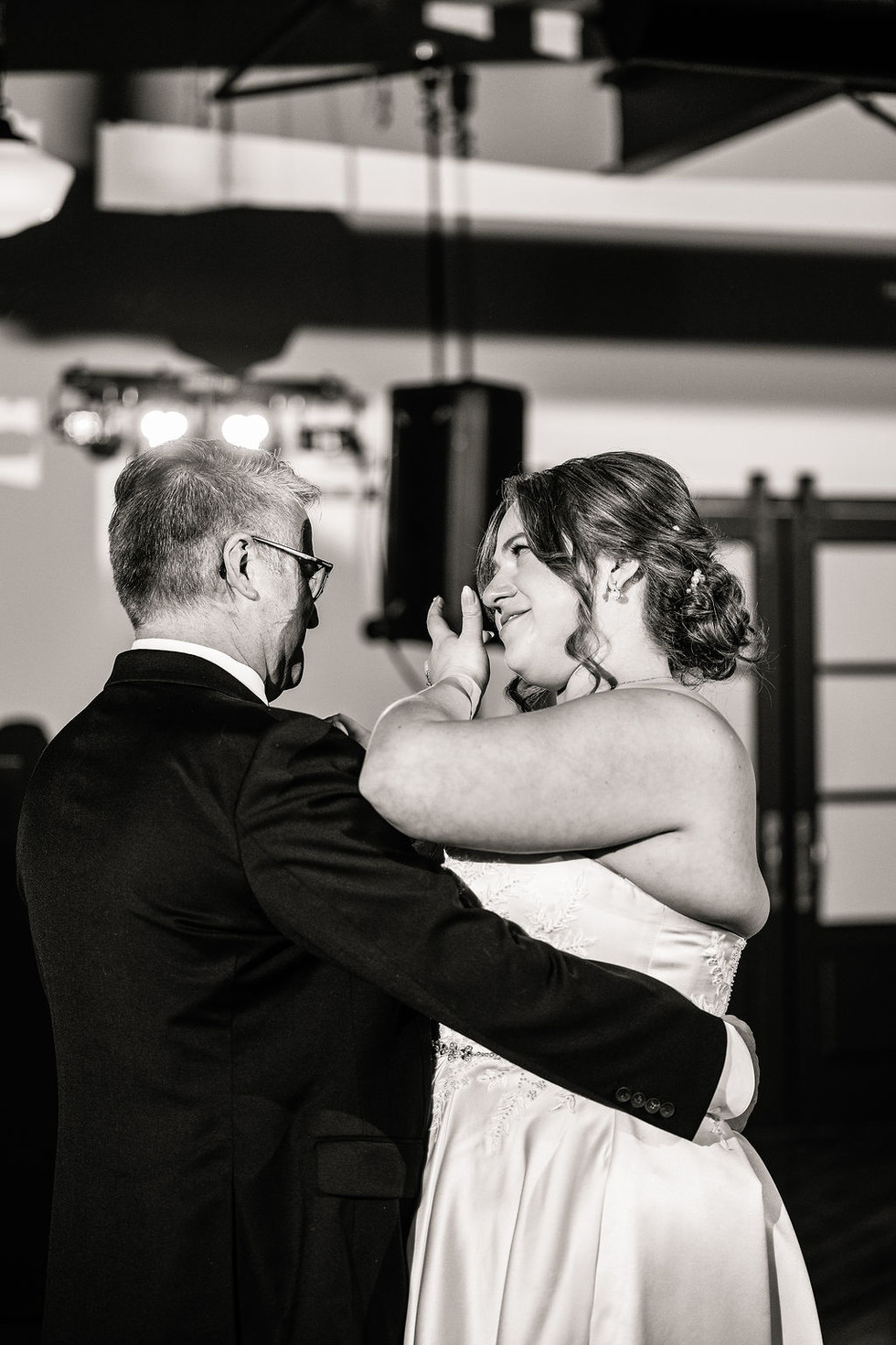 father and daughter dancing  at Lincoln Shoe Co.  in Lititz Pennsylvania