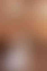 bride in a beaded wedding dress holding a bouquet of calla lillies at Excelsior in Lancaster, Pennsylvania