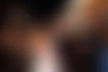 bride and groom surrounded by guests and sparklers  at Lincoln Shoe Co.  in Lititz Pennsylvania