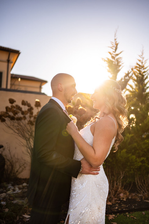 bride and groom dancing during golden hour at The Highlawn