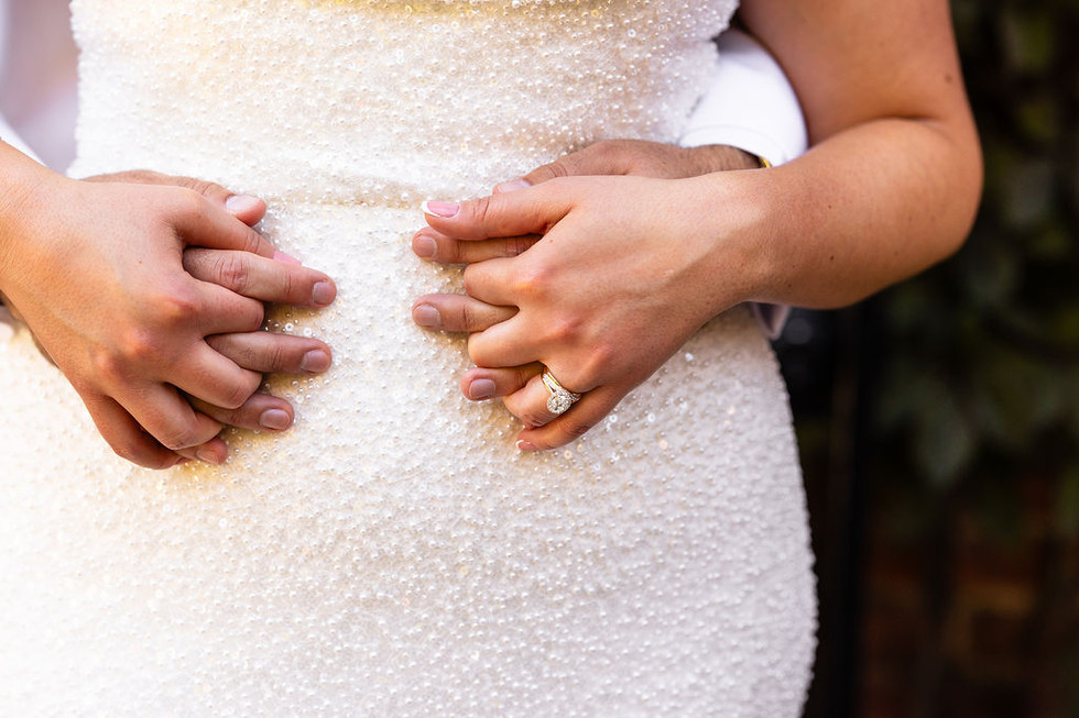 close-up of bride and groom embracing with wedding ring showing at Excelsior in Lancaster Pennsylvania