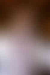 a groom getting ready with his friends in a barn at Tyler Arboretum in Media, Pennsylvania