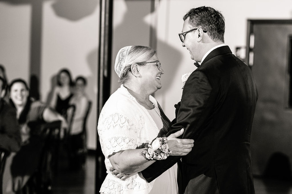 mother and son dancing  at Lincoln Shoe Co.  in Lititz Pennsylvania