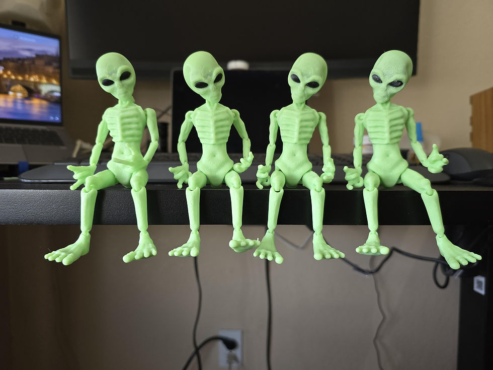 Glow-in-the-Dark Alien Figurine: 3D Printed Poseable Sci-Fi Desk Decor