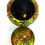 Thumbnail: Footed green and amber color jar with lid